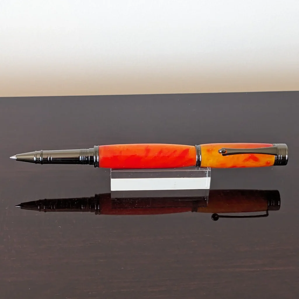 513 Red Orange Rollerball with Gun Metal Fittings