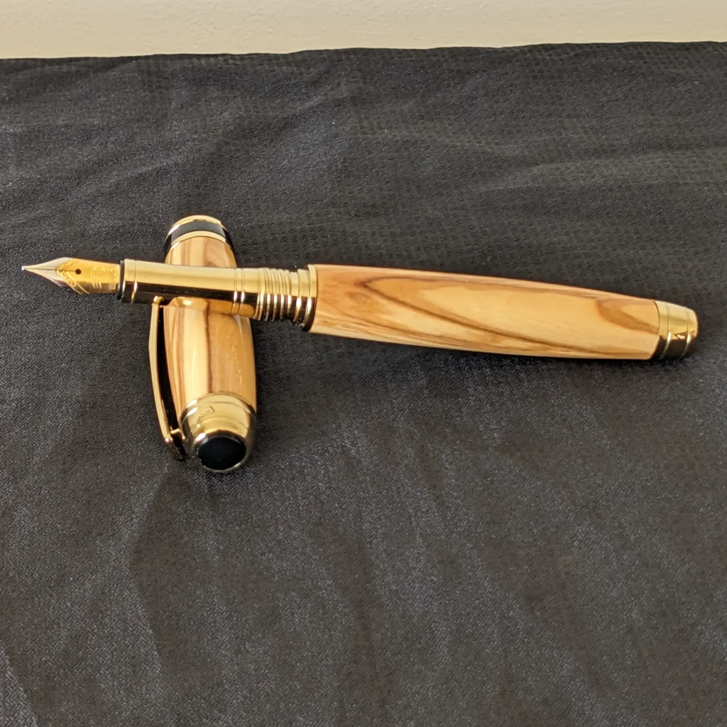 541 Mediterranean Olive Wood Fountain Pen with Titanium Gold Plated and Black Chrome Fittings