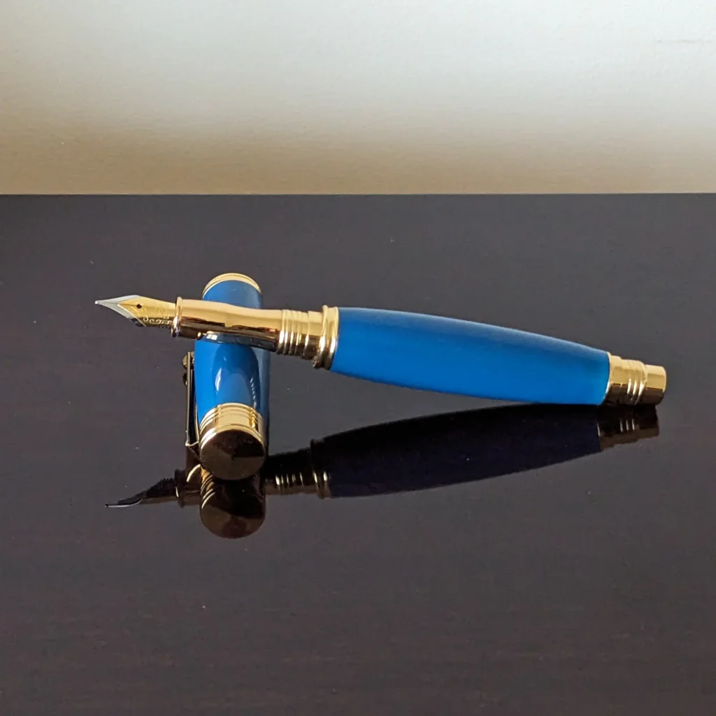 (665) Blue Resin Fountain Pen with Gold Plated Fittings