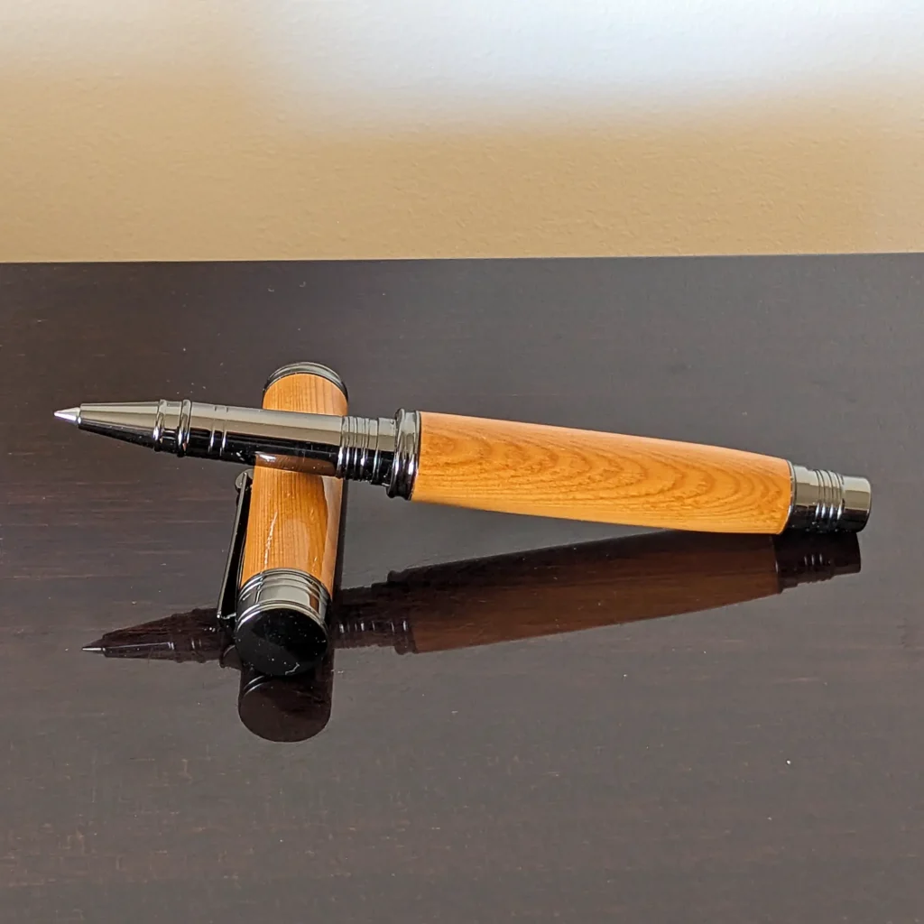 Yew Rollerball Pen with Gun Metal Plate Fittings (913)
