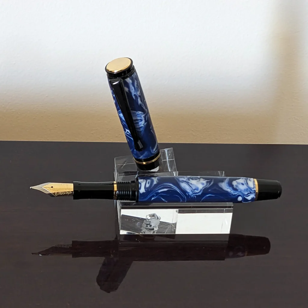 Blue and White Fountain Pen with Black and Gold Fittings (935)