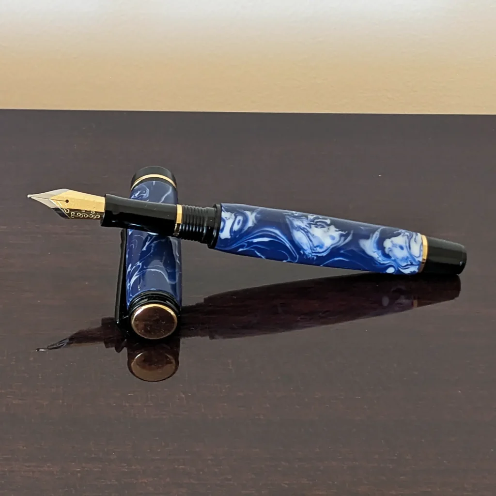 Blue and White Fountain Pen with Black and Gold Fittings (935)