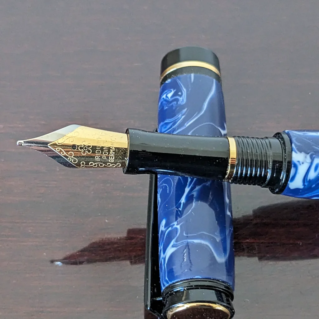 Blue and White Fountain Pen with Black and Gold Fittings (935)
